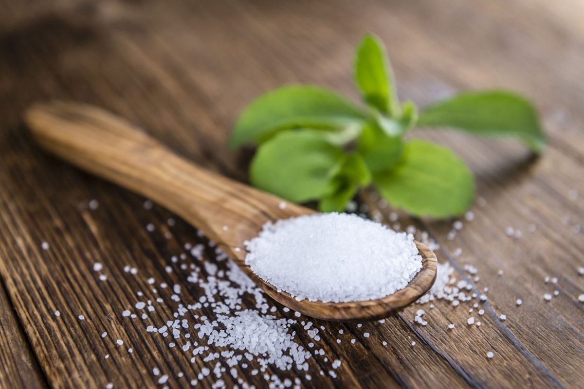 Old wooden table with Stevia Granules (selective focus) Megahome Sitronsyre - Bilde 2